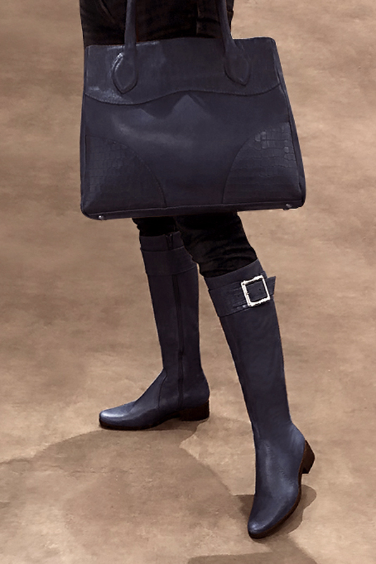 French elegance and refinement for these navy blue riding knee-high boots, 
                available in many subtle leather and colour combinations. Record your foot and leg measurements.
We will adjust this pretty boot with zip to your measurements in height and width.
You can customise the boot with your own materials, colours and heels on the "My Favourites" page.
To style your boots, accessories are available from the boots page. 
                Made to measure. Especially suited to thin or thick calves.
                Matching clutches for parties, ceremonies and weddings.   
                You can customize these knee-high boots to perfectly match your tastes or needs, and have a unique model.  
                Choice of leathers, colours, knots and heels. 
                Wide range of materials and shades carefully chosen.  
                Rich collection of flat, low, mid and high heels.  
                Small and large shoe sizes - Florence KOOIJMAN